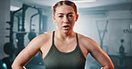 Face, gym and tired with woman, sweating and exercise with endurance and challenge with progress. Portrait, person or girl with fitness or exhausted with workout and health with training or breathing