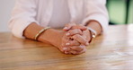 Closeup, senior woman or hands together with retirement, home or anxiety with stress, hope or depression. Apartment, elderly lady or pensioner with mental health, lonely or sad with jewellery or pray