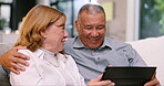 Old people, couple with tablet and relax on couch for communication, video or picture on social media for memory. Conversation, digital and retirement together, internet and browsing while at home