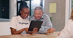 Volunteer, senior man and helping with tablet, search or website with smile, advice and click. African girl, elderly person and digital touchscreen with scroll, learning and app for social media