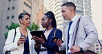 Business people, group and technology with discussion in city for legal strategy and case collaboration. Lawyers, professional team and conversation with tablet for planning and brainstorming outdoor