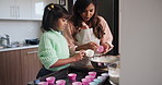 Mother, daughter and helping in kitchen with cake, mixing bowl and teaching for child development. Family, woman and girl kid with cooking, flour and learning for cookies, baking and dessert in home 