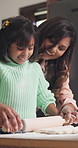 Mother, daughter and happy in kitchen with baking, rolling pin and teaching for child development. Family, woman and girl kid with cooking, dough and learning for cookies, cake and dessert in home 