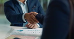 Business people, partnership and handshake for deal, agreement or negotiation in office. Shaking hands, closeup and hiring offer for recruitment, b2b collaboration or data analyst at table in meeting