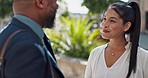 Business people, laughing and discussion outdoor in city with morning commute, partnership and travel. Employees, man and woman with conversation, collaboration and happy for networking in urban town