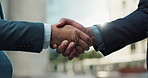 Business people, handshake and closeup for deal, b2b partnership and deal in city, street or welcome. Person, agreement or greeting with respect, hello or meeting with shaking hands on metro sidewalk