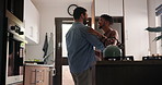 Dancing, gay couple and happy in kitchen, love and connection with romantic partner in house. Lovers, bonding together and young lgbtq men in male relationship, enjoying and freedom for movement