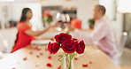 Couple, roses and toast at home with wine glass for celebration of love, romance and valentines day. People cheers for date success, drinking red champagne and luxury dinner at a table with flowers