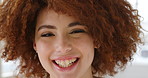 Confident beautiful woman with an afro laughing