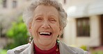 Happy senior, laughing woman and feeling joyful while enjoying her retirement or free time, standing outside. Wrinkles, portrait and face of elderly pensioner lady enjoying freedom and wellness