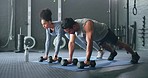 Fitness, gym and couple plank with weight dumbbell for workout, strength and training lifestyle. Exercise, wellness and health of interracial people weightlifting for strong abdomen muscles.