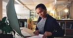 Business woman, computer and typing with document at a desk for data entry in an office. African entrepreneur person working at a desktop with paperwork for information, research or online report