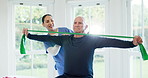 Nurse, senior man and physiotherapy with resistance band for arm exercise in home. Physical therapy, caregiver and stretching with rubber for fitness, rehabilitation or health, training or recovery