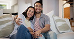 Home, face and hug with couple on a couch and bonding together in a living room, love or relationship. Portrait, apartment and man with woman or embrace with happiness, romance or marriage with trust