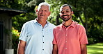 Senior, father and man hug in garden with happiness, love and support of family in retirement. Mature, dad and embrace person with a smile in backyard park on holiday or vacation together in Brazil