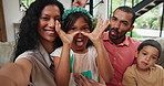 Happy family, goofy face or selfie on sofa with love, holiday or bonding together in living room. Parents, children and funny portrait with smile for gratitude, comedy and relax for weekend in house