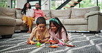 Home, kids on carpet and playing with dinosaur toys and relax with happiness and fun with development. Children, plastic reptile and siblings on the floor with animals for fantasy and game in lounge