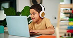 Child, headphones or laptop for online learning on kids website, subscription or education game in kitchen. Happy, boy or maths app with audio for digital tutor, fun or development by abacus in home