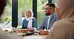 Muslim, family and friends with food or happy at dining table for eid, islamic celebration or hosting. Ramadan, culture and people talking at religious gathering for lunch, discussion or conversation