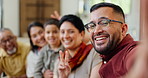 Family, face and smile for selfie on sofa in living room of home together with people at visit. Portrait, love or weekend with boy, parents and grandparents taking photograph in apartment for memory