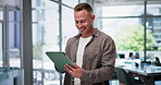 Business, office and man with tablet, typing and connection with creative agency and online reading for blog. Person, graphic designer and agent with tech and research with app and social media post