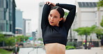 Stretching, fitness and woman in city street for body, warm up or marathon training, run or morning cardio. Exercise, workout or person with arm stretch outdoor for running, performance or challenge