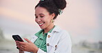 Woman, phone and laughing for communication on vacation, humor and funny conversation on holiday. Happy female person, comedy and scrolling on social media at beach, online and typing on mobile app