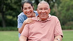 Face, smile and nurse with old man at park for healthcare, rehabilitation and support. Portrait, caregiver and happy senior patient with a disability in wheelchair at garden outdoor for retirement