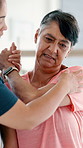 Physical therapy, arm pain and physiotherapist with woman at clinic for injury recovery or treatment. Healthcare, consultation and closeup of medical worker helping senior patient for rehabilitation.