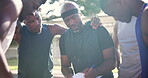 Planning, teamwork or coach with strategy on basketball court for mission, tactics or motivation. Training game, black people or athletes in group for leadership, fitness or writing in a sports match