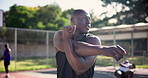 Fitness, basketball and athlete stretching arms for training, game or match on outdoor court. Sports, team and group of young African male athletes with warm up workout or exercise on outside pitch.