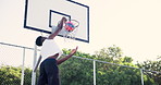 Black man, scoring and dunk on basketball court with fitness, professional skill or performance. Player, goal or game practice with person or athlete jumping in air for training or exercise in USA