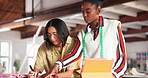 Fashion, designer and people writing ideas in workshop with planning, process or talk about textile choice. Stylist, team and conversation with tailor for creative decision with tablet in boutique