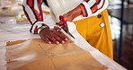 African seamstress, fabric and planning for boutique, startup and creative work with hands and scissors. Designer, workshop and design for fashion, sewing and retail or shop and clothes with textile