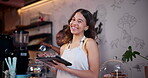 Tablet, funny and woman in coffee shop for online order in small business startup as owner or employee. Portrait, technology and young waitress or barista laughing in cafe for hospitality and service