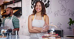 Happy woman, barista and professional at cafe for customer service, order or confidence at coffee shop. Portrait of female person, waitress or owner smile in restaurant for food, drink or dessert