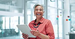 Mature businesswoman, tablet and face for networking in office, online research and internet. Female person, communication and laughing for humor in notification, planning and web or app in portrait