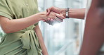 Business people, handshake and meeting in partnership, b2b or agreement for deal, hiring or recruiting at office. Closeup of employees shaking hands for teamwork, collaboration or thank you at work