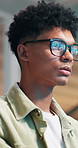 Serious man, coder and glasses in programming for research and development at office. Closeup of male person, developer or programmer in focus for coding, algorithm or problem solving at workplace