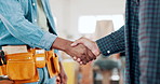 Construction, teamwork or carpenter shaking hands in workshop for a manufacturing deal. Woodwork collaboration, handyman or closeup of happy industrial workers in warehouse in engineering agreement