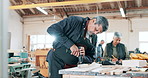 Wood, carpenter and man in workshop drilling with power tools for furniture, production or small business. Construction, project and person in woodworking process, manufacturing or labor in warehouse