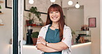 Smile, arms crossed and asian woman at entrance to coffee shop for small business opening or welcome. Portrait, retail and entrepreneur with happy startup cafe owner at door of restaurant for service