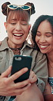 Happy, friends and women laugh with phone outdoor for social media, joke or funny gif communication. Smartphone, comic and people with app for streaming blog joke, video or silly reel, film or meme