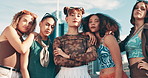 Fashion, gen z and woman friends in city together for girl power, support or trendy style. Portrait, diversity or empowerment and group of young people outdoor on asphalt bridge with attitude