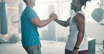 Men, fitness teamwork and high five in gym for workout or training challenge, boxing match or to start practice. Young people, personal trainer or boxer shaking hands for goals, support and good luck
