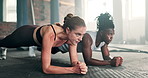 People, plank and fitness on floor at gym for workout, core strength or abdominal training. Interracial man and woman in ab exercise, endurance or stamina on ground together for health and wellness