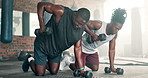 Black man, friends and dumbbells in weightlifting at gym for strength, muscle or indoor workout. African male person or muscular people with barbells for arm or bicep exercise or training in fitness