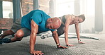 Couple, fitness and mountain climber exercise at gym on floor for workout or training together. Active man and woman, personal trainer or coach for abs, core strength or endurance at health club