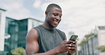 City, fitness and black man with a cellphone, typing and social media with mobile user and New York. Person, happy athlete and runner with a smartphone or connection with internet or workout schedule