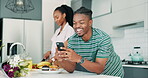 Man, phone and laughing for communication, streaming and internet for funny meme in kitchen. Black couple, happy and scrolling on social media and woman cooking at home, nutrition and healthy meal